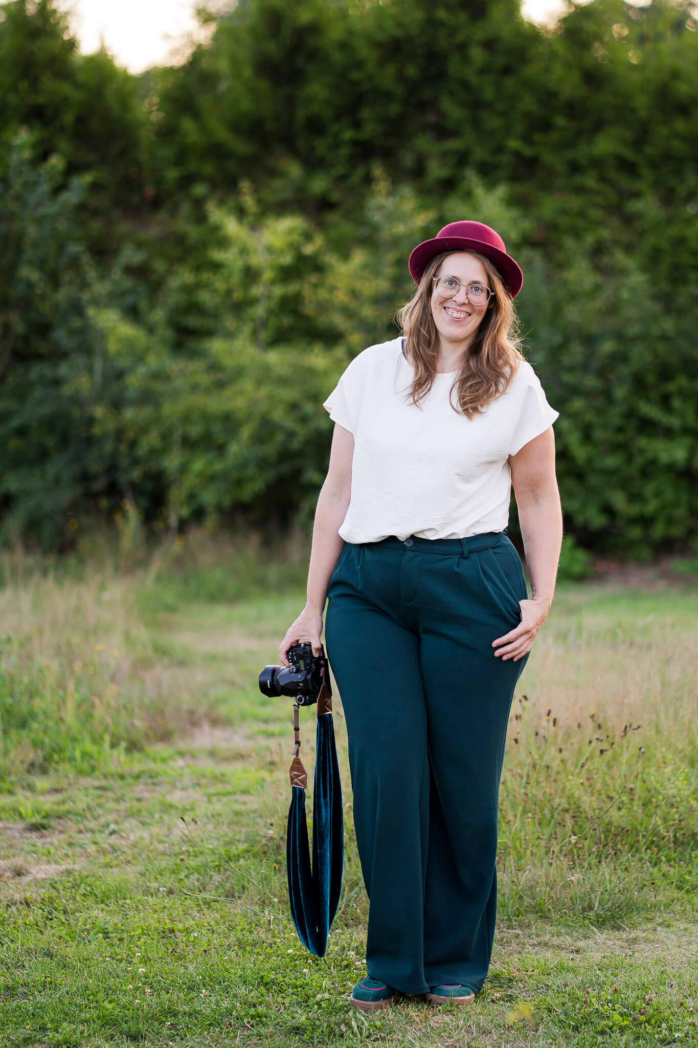 Fotograaf Erica Turmel Fotograaf Erica Turmel met camera in haar hand